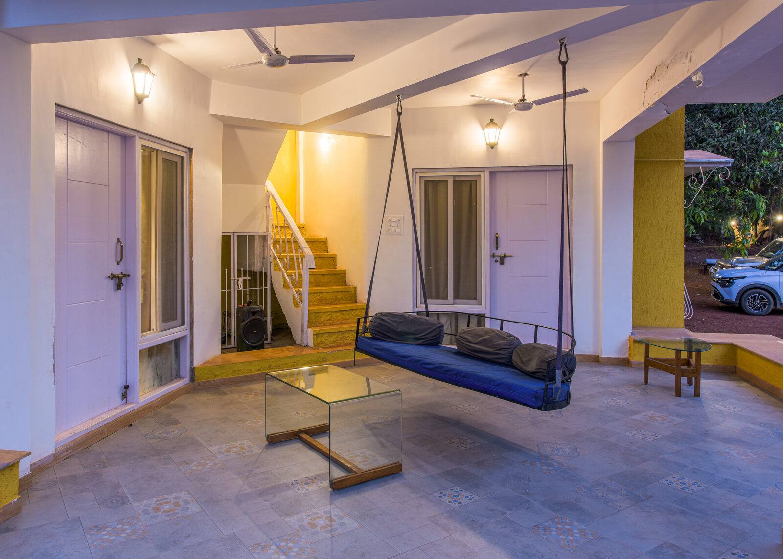 The entrance porch with its swing